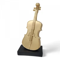 פסל צ'לו מוזהב 1540